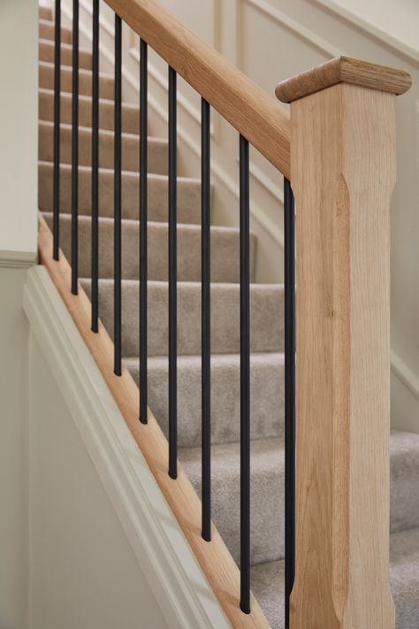 Howdens Staircase, Staircase Bannister Ideas, Black Wooden Spindles Staircase, Staircase Metal Spindles, Stair Spindle Makeover, Stairs With Metal Spindles, Modern Railings For Stairs, Shaker Staircase, Wooden Bannister Ideas