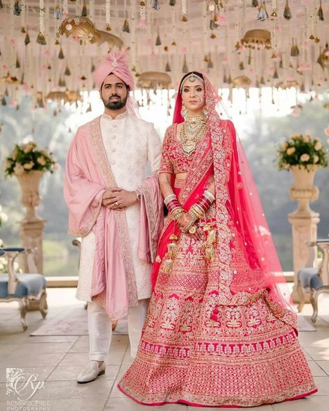 Bride And Groom Indian Wedding Outfit Pastel, Groom Indian Wedding Outfits Pink, Indian Bride Groom Outfits, Pink Bridal Lehenga With Groom, Groom Outfit For Engagement, Marrige Dress, Bride And Groom Wedding Outfit, Bride And Groom Indian Wedding Outfit, Groom Indian Wedding Outfits