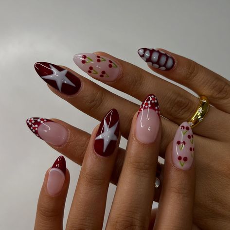 🍒⭐️🍷 • • • • #nailsxkay #nailsnailsnails #apresnails #gelx #gelxnails #prettynails #trendynails #naildesign #nailart #nailextentions #bombnails #cutenails #baddienails #nailinspo #pinterestnails #trendynails #explore #explorepage #scvnails #calinails #LAnails #nailsofinstagram #fallnails #rednails #darkrednails #winenails #starnails #cherrynails #flowernails #crocprintnails Short Designed Nails, Berry Color Nails Designs, Nail Inspo Maximalist, Cool Girl Christmas Nails, Christmas Round Nails, Kacey Musgraves Nails, Mixed Design Nails, Red On Red Nails, Canada Nails Designs