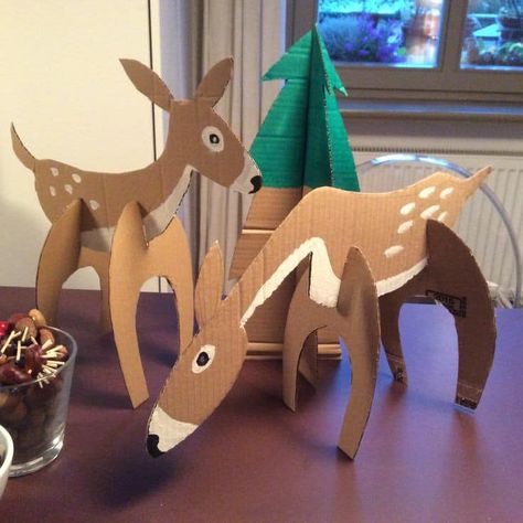 Wonderful Animal Crafts using Cardboard. - Best Out of Waste Crafts Using Cardboard, Christmas Cabin Decor, Jungle Theme Decorations, Diy Christmas Village Displays, Cardboard Animals, Diy Christmas Village, Christmas Props, Christmas Concert, Christmas Village Display