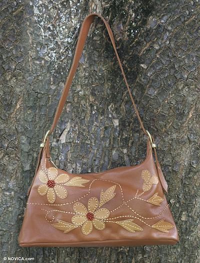 Artisans from the Mãos da Prata Association combine warm brown and tan for this charming shoulder #bag. Embroidered Brown Hobo Shoulder Bag, Brown Embroidered Hobo Shoulder Bag, Embroidered Brown Tote Hobo Bag, Embroidered Brown Hobo Tote Bag, Embroidered Brown Hobo Bag, Embroidered Brown Crossbody Shoulder Bag, Brown Embroidered Crossbody Shoulder Bag, Daily Use Brown Embroidered Hobo Bag, Brown Embroidered Satchel For Travel