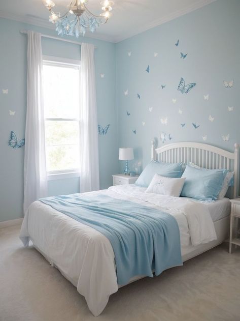 Create a dreamy light blue aesthetic for your bedroom by adorning the walls with butterfly decals. Complete the look with a sleek white bedframe and drape fairy lights across the room for a whimsical touch. Blue Pastel Bedroom Aesthetic, Pastel Blue Bedroom Walls, Soft Blue Room Ideas, Light Color Room Ideas Bedrooms, Bedroom Ideas For Girls Aesthetic, Blue Color Room Ideas Bedrooms, White And Pale Blue Bedroom, Light Blue Rooms Bedroom, Girls Blue Room Ideas