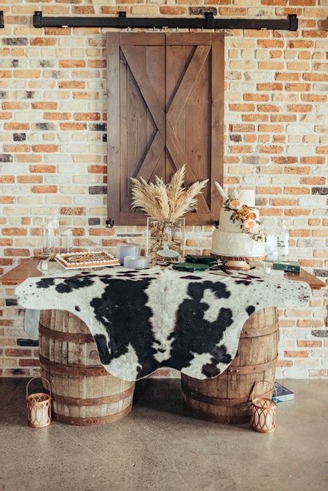 Western Theme Wedding Reception, Western Boho Wedding Guest Book, Boho Western Dessert Table, Boho Wedding Cake Backdrop, Western Sign In Table, Western Wedding Centerpieces Wedding Table Decor, Cowhide Wedding Cake Table, Cowgirl Wedding Decorations, Western Chic Bridal Shower Ideas