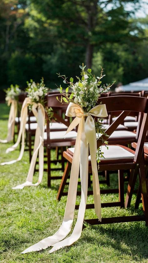 18 Wedding Aisle Decoration Ideas For Your Special Day Cheap Aisle Decor, Potted Plants Down Wedding Aisle, Indoor Wedding Isles Decoration, Bows On Chairs Wedding Ceremony, Wedding Aisle Simple Outdoor, Bow Aisle Decor, Aisle Doors Wedding Entrance, Ceremony Aisle Chair Decor, Fall Aisle Decorations Wedding Outdoor Ceremony