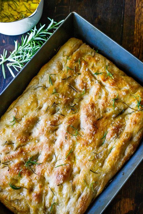 Hands down, this is the best focaccia bread recipe we've ever made! Topped with flaky sea salt and fresh rosemary, it's golden and airy with a crispy bottom. Easy to make. Vegan. Foccassia Bread Art, Foccacia Bread With Active Dry Yeast, Traditional Focaccia Bread, Rosemary Fig Foccacia, Italian Focaccia Bread, Foccacia Bread With Tomatoes, The Best Foccacia Bread, Easy Homemade Focaccia Bread, Foccacia Bread Appetizer