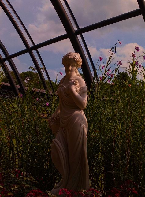 Garden Goddess Art, Statues In Gardens, Spring Goddess Aesthetic, Daughter Of Persephone Aesthetic, Statue In Nature, Daughter Of Aphrodite Aesthetic, Greek Statues Aesthetic, Persephone Statue, Greece Statue