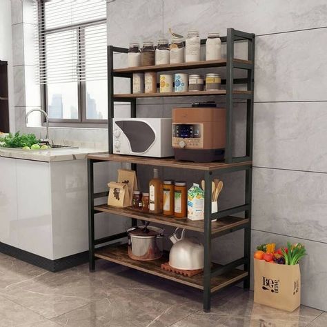 A baker's rack that might be named for chefs, but can be used in basically any room where you need a ton of storage and a nice workspace. 3 Tier Kitchen Storage, Wooden Kitchen Stand Shelf, Standing Shelves For Kitchen, Free Standing Shelf In Kitchen, Standing Kitchen Shelf, Open Shelving In The Kitchen Standing Shelves, Apt Kitchen Storage, Utility Rack Kitchen Storage, Microwave Organization