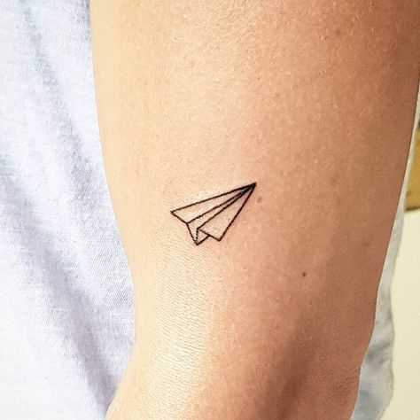 101 Best Paper Airplane Tattoo Designs You Need To See! 45 Outsons Paper Airplane Tattoo, Best Paper Airplane, Paper Airplane Tattoos, Paper Plane Tattoo, Popular Tattoo Designs, Feather Tattoo Meaning, Airplane Tattoo, Shoulder Sleeve Tattoos, Adventure Tattoo