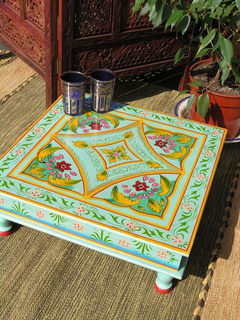 painted table idea. You can find pretty, low carved Indian tables and stools at www.bringingitallbackhome.co.uk Indian Table, Hantverk Diy, Unique Bed, Indian Furniture, Unique Beds, Painted Chairs, Funky Painted Furniture, Funky Furniture, Indian Decor