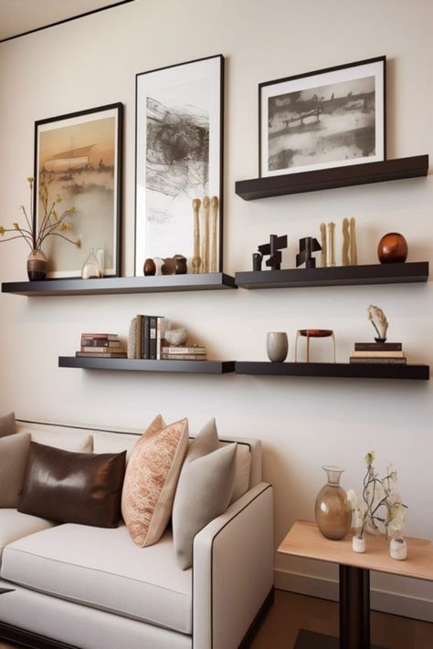 Infuse elegance into any room with floating shelves that blend function and style effortlessly. 🌟 Whether you're displaying your favorite reads, cherished mementos, or just seeking to declutter, these shelves are your go-to solution. They not only save space but also serve as a stunning visual element. Looking for the best floating shelves to complement your decor? Check out our top picks that are perfect for sale now! #GoTinySpace #FloatingShelves Floating Shelves And Picture Wall, Modern Floating Shelves Living Room, Awkward Corner Space Living Room, Shelves Above Couch, House Refurbishment, Above Couch Decor, Couch Wall Decor, Above The Couch, Wall Shelves Living Room