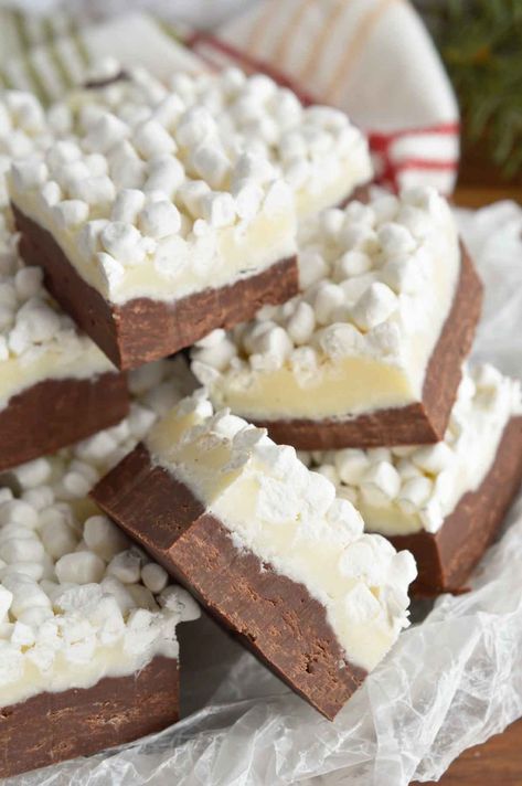 This Hot Chocolate Fudge Recipe brings two of your favorite winter desserts together. Hot cocoa and rich fudge topped with marshmallows! The perfect holiday treat. #fudgerecipes #holidayrecipes #holidaydesserts #easyfudgerecipes #chocolaterecipes #easyfudgerecipes #microwavefudge Hot Chocolate Fudge Recipe, Holiday Fudge Recipes, Holiday Fudge, Christmas Candy Easy, Easy Christmas Candy Recipes, Hot Chocolate Fudge, Microwave Fudge, Fudge Recipes Chocolate, Nutella Desserts