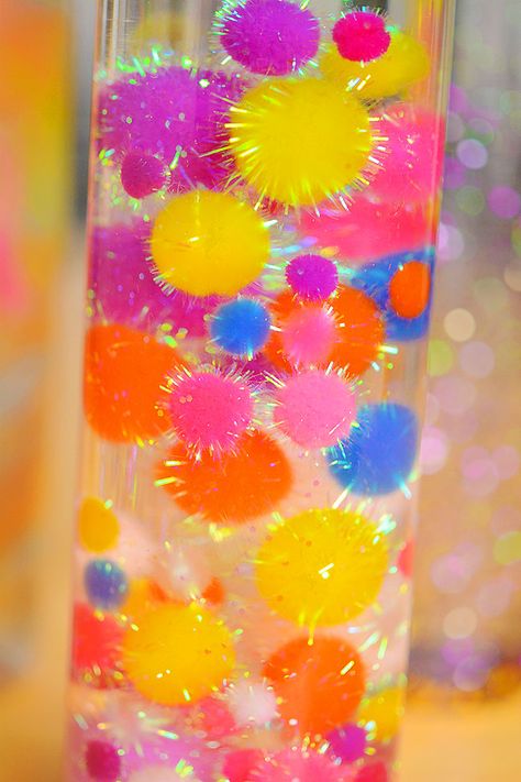 Pompom Sensory Bottle, Preschool Sensory Bottles Diy, Relax Bottles Calm Down, Sensory Calming Bottles, Make Your Own Sensory Bottles, Sensory Shaker Bottles, Best Sensory Bottles, Sensory Bottle Ideas For Preschoolers, Cool Sensory Bottles