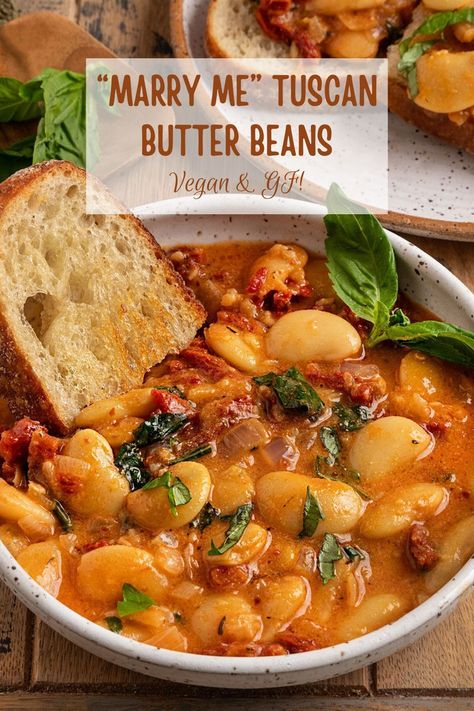 Whether you call them Marry Me Butter Beans or Tuscan White Beans, this simple dish makes the easiest vegan and gluten-free meal! With only 30 minutes required, it's a truly delicious & cozy weeknight dinner made with a rich and creamy sun-dried tomato sauce, hearty white beans, and fresh basil. Beans For Dinner Meals, Mediterranean Diet Meals Dinners, Mediterranean Bean Dishes, Good Vegetarian Recipes Dinners, Italian Bean Dishes, Tuscan Marry Me Butter Beans, Marry Me Beans Vegan, Vegan Lentil Recipes Healthy, Meals Using Tomatoes