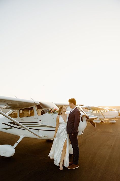 adventure elopement, california elopement, elopement ideas, airport elopement, airplane elopement, california wedding photographer, wedding dress inspo, simple wedding dress, satin plain wedding dress, nontraditional wedding day, airport photoshoot ideas, airport couples photos, pilot wedding inspo, spring elopement, spring wedding dresses, spring wedding, spring wedding flowers Airplane Hanger Wedding, Pilot Wedding, Airport Wedding, Hangar Wedding, Airplane Wedding, Aviation Wedding, Kylie Morgan, Spring Elopement, Mccall Idaho