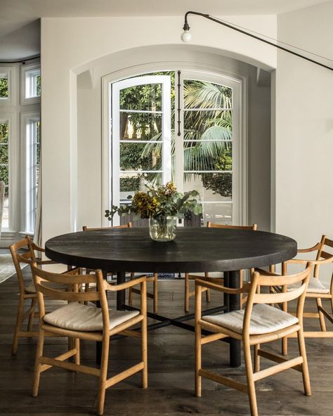 Jake Arnold on Instagram: “Beverly Hills breakfast nook, 2019 🖤 @michaelcliffordphotography” Tall Curtains, Limestone Fireplace Surround, Jake Arnold, Drapery Treatments, Wegner Chair, Cool Neutrals, Reclaimed Wood Beams, Marble Fireplace Surround, Stunning Interiors