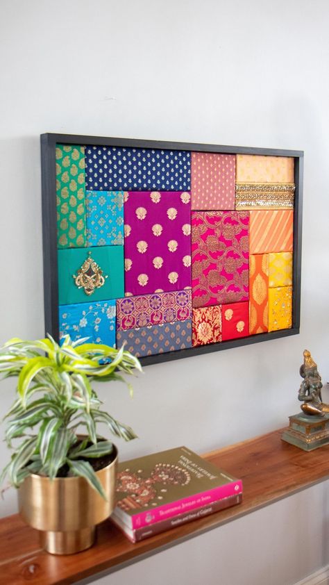 Mitesh | Home & Design | I’m a bit of a hoarder when it comes to fabric scraps always thinking I’ll use it for a project. From saree blouse piece remnants to old… | Instagram Cloth Framed Wall Art, Fabric In Frames Wall Art, Interior Canvas Painting, Saree Decoration Ideas On Wall, Indian Decoration Ideas House, Wall Decor With Fabric, Fabric Recycling Ideas, Fabric Wall Decor Diy, Wall Fabric Decor