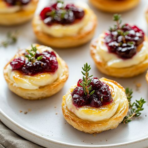 Easy Cranberry Brie Bites - Krystel's Cooking Three Ingredient Cranberry Brie Bites, Brie And Onion Puff Pastry, Cranberry Brie Bites With Orange Marmalade, Brie Bites Phyllo Cups, Cranberry Phyllo Brie, Brie In Phyllo Cups, Easy Cranberry Brie Bites, 3 Ingredient Cranberry Brie Bites, Brie Appetizer Thanksgiving