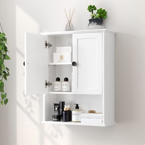 PRICES MAY VARY. Large Storage Space: This OONNEE 24" W x 30"H x 9" D bathroom wall cabinet has a large open storage space at the bottom for easy access or display and large storage space with an adjustable shelf behind 2 doors. The shelf can be adjusted to 3 different heights for customizable storage space. A great over toilet space saver storage cabinet Elegant Wall Cabinet with Classic Metal Handle: Classic metal door handles add elegance to this white bathroom wall cabinet. The wall mounted Above The Toilet Storage, Storage Cabinet Wall, Cabinet Above Toilet, Over Toilet Storage Cabinet, Wall Hanging Cabinet, Bathroom Wall Storage Cabinets, Bathroom Cabinets Over Toilet, Bathroom Storage Over Toilet, Toilet Storage Cabinet