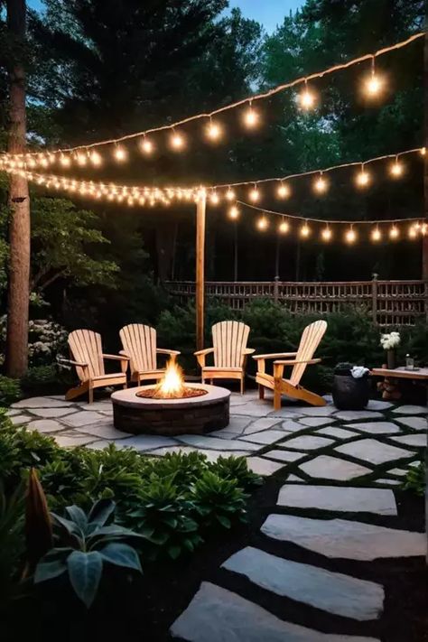 Backyard fire pit area with flagstone pathway and Adirondack chairs Fire Pit Ideas Backyard With Pavers, Best Fire Pit Ideas, Shed And Fire Pit Area, Fire Pit Concrete Patio, Outdoor Fire Pit Area With Lights, Flagstone Patio With Fireplace, Landscape Around Fire Pit, Deck And Fire Pit Ideas, Fire Pit Ideas Backyard Pavers