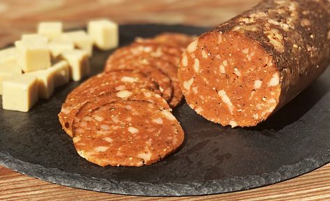 This peppery, garlicky, wine-infused vegan salami gets its fattiness and an extra boost of flavor from bits of provolone cheese. I'm calling it "Jen"oa-style. 🥴 🤣Ingredients1 kg bread flour (approximately 7 1/4 cups)If using all purpose flour, add another 140g/1 cup690 ml water Vegan Provolone Cheese Recipe, Vegan Salami, Seitan Deli Slices, Washed Flour Seitan Recipes, Seitan Recipes Vital Wheat Gluten, Seitan Recipes, Vegan Worcestershire Sauce, Provolone Cheese, Seitan