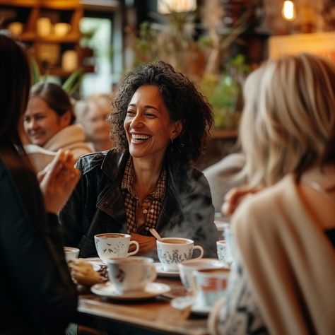 Joyful Coffee Gathering: A group of friends sharing laughter and stories over coffee at a cozy, bustling café. #woman #laughing #coffee #friends #café #happiness #meeting #social #aiart #aiphoto #stockcake https://ayr.app/l/wjJw People In Cafe Photography, Community Pictures People, Cafe People Photography, Coffee Shop Events, Coffee Shop Photoshoot Ideas, Friends Drinking Coffee, Coffee Gathering, Women Meeting, Cafe Photoshoot