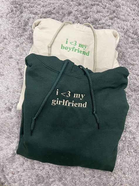 ✰COMES WITH TWO! ITEM 1: refers to "i <3 my boyfriend" ITEM 2: refers to "i <3 my girlfriend" Photo features: Tan X Green Thread // Forest Green X Tan Thread ✰Embroidered Matching Sweatshirts✰UNISEX✰Hand drawn and designed✰Super soft and comfy! *Sizes 2XL-3XL may be subject to longer processing times since we don't carry a large amount of inventory in those sizes, so we would have to put in a special order from our supplier! Thank you for understanding.❗️#LoveStory #RomanticEncounters #HeartfeltConnections #DateNightIdeas #SoulmateSearch #FlirtyFridays #CandlelitDinners #StarryEyedMoments #LoveQuotes #DreamyDates #WhisperedPromises #AmourAdventures I Love My Partner, Love My Partner, Girlfriend Photo, Matching Hoodies For Couples, Tan Hoodie, Green Thread, Matching Hoodies, Dating Girls, Cute Birthday Gift