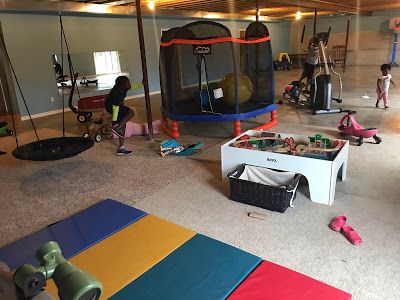 8 Must-Have Items For Your Child's Home Sensory Gym Garage Room Conversion, Sensory Gym, Gym Shed, Faux Wood Flooring, Sensory Equipment, Diy Sensory, Garage Room, Gym At Home, Miller Homes