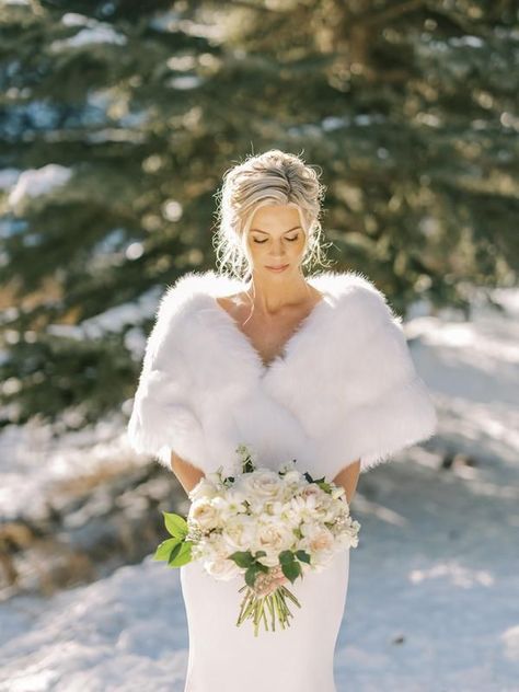 Wedding Dress Shawl Winter, Winter Wedding Dress Shawl, Fur Coat Over Wedding Dress, Winter Wedding Dress Fur Shawl, White Fur Shawl Wedding Winter Bride, Fuzzy Wedding Dress, Winter Wedding Dress With Shawl, Simple Winter Wedding Dress Christmas, Winter Wedding Accessories Brides