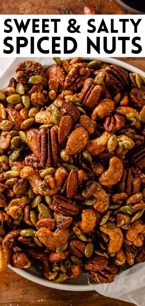 This savory rosemary spiced nuts recipe is the perfect anytime snack or appetizer. The mix of almonds, pecans, cashews, pistachios and pumpkin seeds are crunchy, salty, savory, sweet and even a little spicy. They’ve got it all! Spicy Nuts Recipe Holidays, Mix Nuts Recipes, Spiced Nuts Christmas, Seasoned Nuts Recipe Savory, Spicy Nuts Roasted, Spiced Nuts Recipe Holidays, Spiced Nuts Recipe Savory, Roasted Nuts Recipe Savory, Seasoned Nuts Recipe