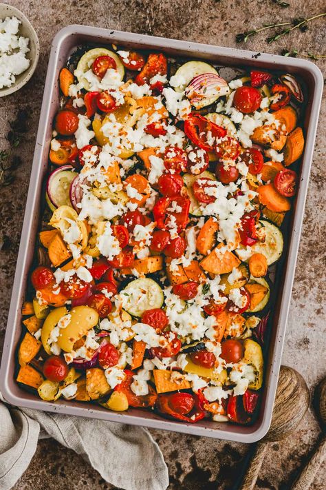 Indulge in the simple joys of oven roasted vegetables with feta cheese! Perfect for busy weeknights or impressing guests, this versatile and healthy dish is a feast for the senses. Learn how to perfect this sheet pan vegetable recipe! Roasted Veggies In Oven, Grilled Vegetable Recipes, Oven Vegetables, Roasted Vegetables Oven, Vegetable Recipe, Feta Recipes, Roasted Vegetable Recipes, Simple Joys, Veggie Side Dishes