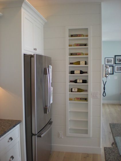 A creative way to store your wine is to make use of the space between the studs in your wall. But make sure your rack is built with a lip to keep the wine from rolling off the edge. Beach Style Kitchen, Wine Rack Design, Built In Wine Rack, Cottage Kitchen, Wall Storage, Wine Storage, Kitchen Remodel Idea, Counter Top, Küchen Design