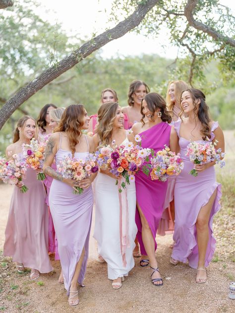 Bride and Bridesmaids in Pastel Lavender Dresses With Bright Bouquets Lilac And Peach Bridesmaid Dresses, Lilac Bridesmaids Dresses, Pink And Purple Bridesmaids, Light Lavender Bridesmaid Dresses, Pastel Wedding Color Schemes, Bright Bridesmaids, Multicolour Wedding, Lilac Bridesmaids, Bridesmaid Colours