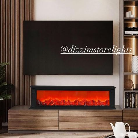 FIRE PLACE DECOR LIGHT 🔥🔥🔥 This artificial fireplace lamp creates a soft subtle that adds character to your surroundings, you can decorate your bedroom, in corridor, also for Holiday Hotel, Restaurant with this electric fireplace lamp. A great gift for any season. Tshs 250,000/= Urefu cm 20 Upana cm 100 Inatumia Umeme Pia inaatumia battery 🔋🪫 Huduma Ya Ufungaji Wa Taa Inapatikana (Intallations) Kwa Gharama Nafuu 🔧🪛🛠️🧰🔌 Tunafanya Delivery Dar, Mikoani na n’chi jirani Kwa uhakika Zaidi. 🚛... Fireplace Lamp, Amantii Electric Fireplace, Electric Fireplace Flame Color, Living Flame Electric Fire, Artificial Fireplace, 70” Electric Fireplace, 75” Electric Fireplace, Holiday Hotel, Electric Fireplace