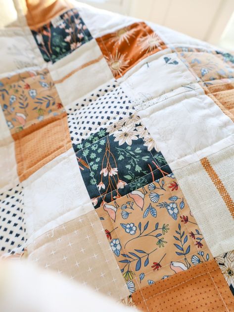 There is something so classic and simple about a patchwork square quilt. It feels homey, vintage, yet simple enough to be classified as "modern."There is something so classic and simple about a patchwork square quilt. It feels homey, vintage, yet simple enough to be classified as "modern." This FREE PDF download includes instructions for Baby and Throw size quilts using either pre-cut 5" squares or a smaller square. The pattern is beginner friendly and a great project fo How To Make A Patchwork Quilt For Beginners, Easy Block Quilts For Beginners, Quilts Patterns Beginner, 5 In Square Quilt Pattern, 6 Fabric Quilt Pattern, Square Pattern Quilt, How To Make Patchwork Quilt, Beginner Quilts Free Patterns, Basic Patchwork Quilt