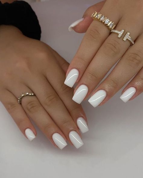 Are you in search of some attractive white nail designs to experiment with during this season? If yes, then you have landed on the right article! As summer is approaching, I have curated a list of my preferred styles to offer you some ideas. I have included various designs ranging from abstract to indie to cater to different preferences.Many of these styles can be easily replicated in the comfort of your own home! If you’re interested in trying a matte style, Classy White Nails Short, Short White Classy Nails, White Nail Manicure, White Square Nails Acrylics, Little Nails Ideas, White Design Gel Nails, Winter White Nails Short, Elegant White Nails Classy, White Nails Acrylic With Design