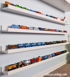 Got too many toy cars and matchbox cars? Check out these 11 genius hot wheels display ideas - they double as storage and organization but they are also beautiful as playroom decor! Toy Train Storage, Train Storage, Train Bedroom, Toy Trains Storage, Gray Room, Hot Wheels Display, Train Room, Toy Trains, Toddler Bedrooms