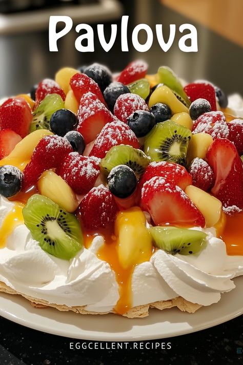 If you are looking for a delightful and light dessert, a Pavlova is the ideal choice. This meringue-based treat boasts a crisp crust and a soft, marshmallow-like center, often topped with whipped cream and fresh fruits. #Pavlovan recipe #Pavlova cake #Pavlova dessert #pavlova recipe easy #pavlova recipe mini #pavlova recipe christmas #pavlova recipe bluely #pavlova recipe chocolate #pavlova recipe with lemon curd #pavlova recipe vegan Chocolate Pavlova Recipe, Pavlova Recipe Easy, Christmas Pavlova Recipe, Mini Pavlova Recipe, Easy Pavlova Recipe, Cake Pavlova, Easy Pavlova, Lemon Curd Pavlova, Christmas Pavlova