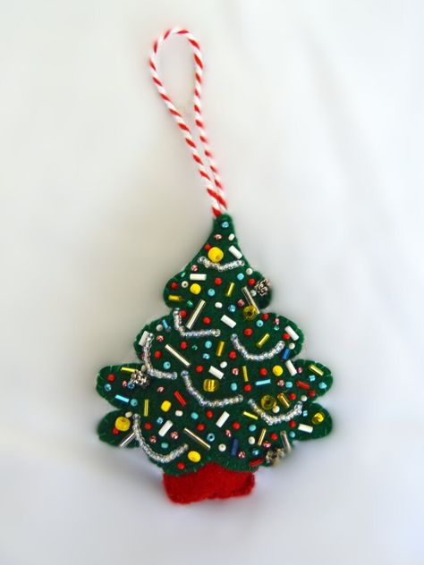 Each ornament is lovingly designed with vibrant colors and detailed embellishments, making them a timeless addition to your holiday traditions. These ornaments are perfect for gifting or for adding a whimsical, handmade touch to your own seasonal décor.

**Product Details:**
- Handmade with felt and bead accents
- Set includes 5 unique designs
- Roughly 4 inches tall
- Ready to hang with attached loops Weird Christmas, Felt Ornaments Diy, Diy Felt Christmas Ornaments, Embroidery Ornaments, Initials Ornament, Felt Beads, Felt Christmas Decorations, Felt Christmas Tree, Holiday Display