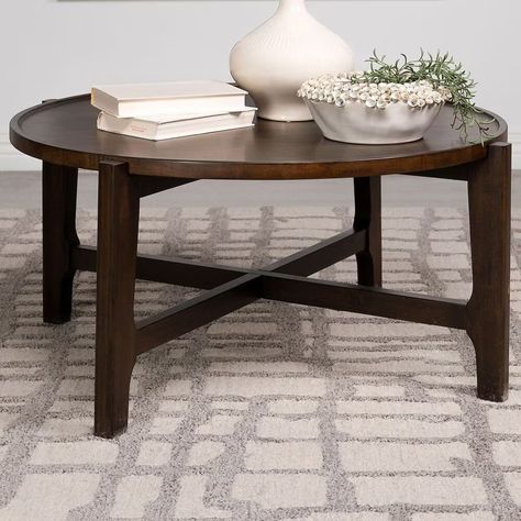 Pacific Landing Cota Round Coffee Table in Dark Brown | Shop NFM Dark Wooden Coffee Table, Architectural Aesthetic, Brown Coffee Table, Living Room Tables, Family Furniture, Kitchen Sideboard, Hardwood Tile, Gathering Place, Entertainment Furniture