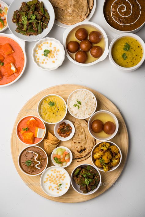 Dsc 2731 by stockimagefactory. North Indian Hindu Vegetarian food Thali or food platter with assorted food in serving bowls #Sponsored #North, #Indian, #Hindu, #Dsc Food Thali, Indian Wedding Food, South Indian Thali, Indian Food Photography, Variety Food, Food Platter, Fav Food, Vegetarian Snacks Recipes, Desi Food