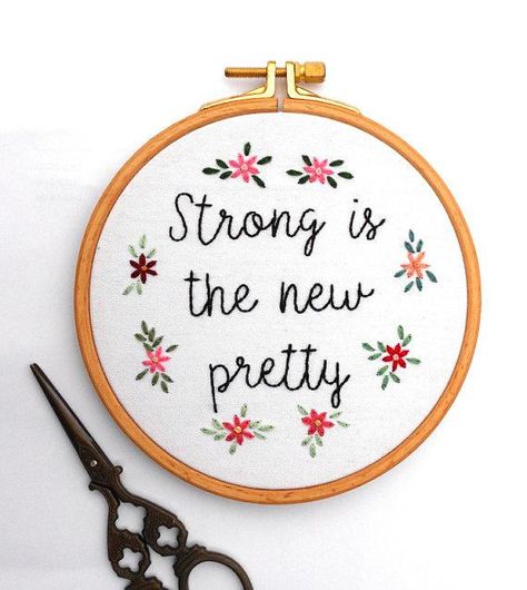 The inspirational quote Strong is the New Pretty is hand stitched and surrounded by lovely floral embroidery. It is set in a round 5 hoop or you can upgrade to a 7-inch hoop. The wooden hoop is ready to be hang on the wall or stand alone on shelves. All pieces are secured to the hoop, Hoops Quotes, Embroidery Learning, Feminist Embroidery, Embroidery Crafts, Embroidery Hoop Wall, Embroidery Tshirt, Embroidery Hoop Art, Embroidery Tutorials, Embroidery Techniques