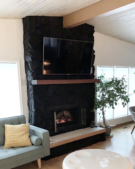 Painted Rock Fireplaces, Mid Century Modern Makeover, Painted Stone Fireplace, Stone Fireplace Makeover, River Rock Fireplaces, Painted Brick Fireplaces, Paint Fireplace, Brick Fireplace Makeover, Black Fireplace