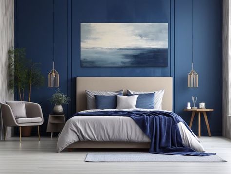 19 Incredible Coastal Bedroom Ideas to Achieve Beach Vibe Aesthetics 33 Minimalist Navy Bedroom, Ocean Blue Interior Design, Grey And Navy Blue Bedding, Blue Wall Bedroom Decor Ideas, Navy Grey White Bedroom, Blue Accented Bedroom, Deep Ocean Bedroom, Navy Wall Bedroom Ideas, Blue Grey Wall Paint