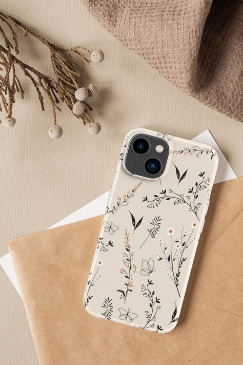 Phone case available for multiple iPhone models, in snap, soft and though cases. Iphone models available: 4s, 5s, 5c, 6, 6s, 7, 8, XR, X, XS, 11, 12, 13, 14. Aesthetic phone case, with a one line art flower pattern in neutral color. Beautiful vintage flower pattern that fits a boho aesthetic. Boho line art design in beige and burnt orange. Cute wild flowers pattern design. Iphone 13 Cases Aesthetic, Noelle Core, Aesthetic Phone Case Ideas, Beige Phone Case, March Aesthetic, Flowers Pattern Design, Boho Phone Case, Boho Line Art, Chic Phone Case