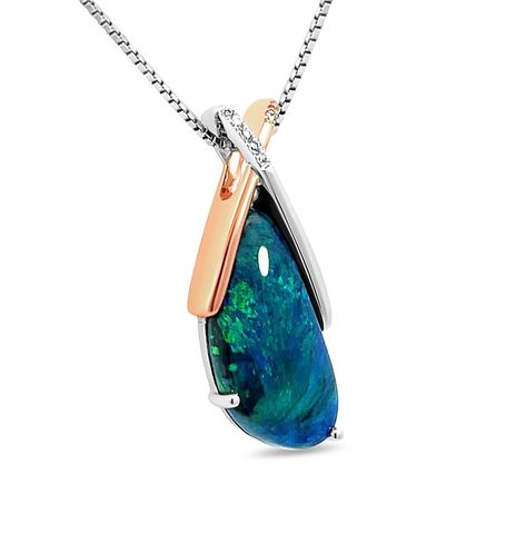 An extremely fashionable design, the “Beaming For Me” black opal pendant presents a mesmerising colour blend of deep blue and green hues. Featuring an attractive black opal hailing from Lightning Ridge, Australia, this gemstone is a perfect gift from mother nature. ⁠ ⁠ This pendant will add a refined touch to your outfit and will remain a timeless stand-out piece in your jewellery collection.⁠ ⁠ ⁠ ⁠ #SpreadHappiness #EthicallySourced #LightningRidgeOpal #RenataBernardDesigns #LimitedEditionBe... Luxury Ethiopian Opal Pendant Jewelry, Opal Pendant With Natural Stones, Ethiopian Opal Pendant Fine Jewelry, Luxury Artisan Opal Necklaces, Ethiopian Opal Oval Pendant With Gemstone, Black Opal Pendant, Lightning Ridge Opal, Lightning Ridge, Green Hues