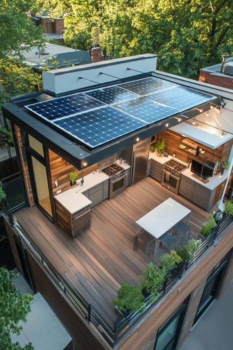 Modern house rooftop deck with a solar panel and outdoor kitchen. Check out all of these modern houses with roof decks that boost both style and functionality. Rooftop Kitchen Ideas, Home With Terrace, Covered Rooftop Terrace, Houses With Rooftop Decks, Roof Top Designs For Houses, Solar Panels Roof Design, Retractable Roof Architecture, Small House With Rooftop Deck, Rooftop Design House