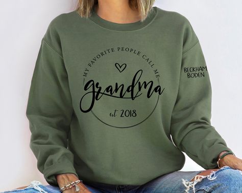 Personalized Grandma,Custom Pocket and Sleeve Sweatshirt,Personalized Grandma Crewneck, Grandmother Sweatshirt with Kids Name,Mom Sweatshirt by JinxeyDesigns on Etsy Great Grandma Sweatshirt Ideas, Grandparent Sweatshirt Ideas, Grandma Vinyl Shirt, Grandma Sweatshirt Ideas, Grandma Sweatshirts With Grandkids Names, Grandparents Sweatshirt, Grandma Sweatshirt, Idee Cricut, Mom Sweater