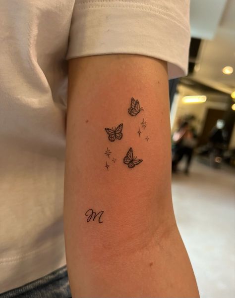 215+ Adorable Dainty Tattoos Ideas (2023) - TattoosBoyGirl Butterflies Back Of Arm Tattoo, Butterfly Flying Up Arm Tattoo, Fine Like Hand Tattoos, Best Friend Spanish Tattoos, 3 Dainty Butterfly Tattoo, Small Tattoos Meaning Self Love, Dainty First Tattoos, Peace Over Everything Tattoo, Center Stomach Tattoos