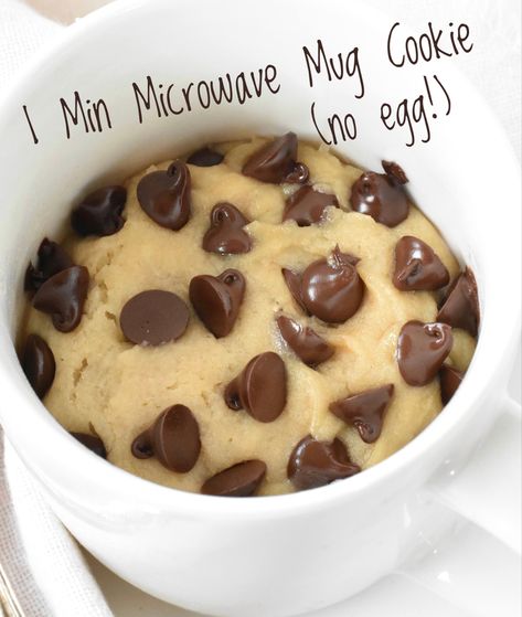 Satisfy your chocolate cravings with this amazing choc chip cookie in a mug! It only takes 1 minute to cook in the microwave. Mug Cookie Microwave No Egg, Microwave Cookie In A Cup No Egg, Chocolate Chip Cookies Mug Cake, Chocolate Chip Cookie Mug Cake No Egg, Mug Cakes Chocolate Chip, Chocolate Chip Cookie In A Cup, Easy Stuff To Bake At Home, Mug Cookie No Egg, Mug Cake Microwave Chocolate Chip