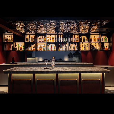 The Red Iron Rooftop, Gurugram Completed | 2024 Say hello to our latest creation - a 2600 Sq.Ft. terrace in Gurugram that’s a blend of bold design and refined elegance. The centerpiece is an electrifying bar area, where bold red tones meet sophisticated gray hues, striking the perfect balance between fun and elegance. A clever mirror backdrop extends the space, while backlit shelves add a playful twist with their unique forms. The standalone bar counter is more than just a centerpiece; it’... Mirror Bar Shelves, Backlit Shelves, Mirror Backdrop, Bar Shelves, Bar Mirror, Pool Bar, Bar Area, Bar Areas, Bar Counter